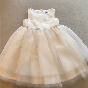 White tulle dress with silver glitter.